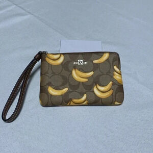 COACH Wristlet, Banana Print. NWT.